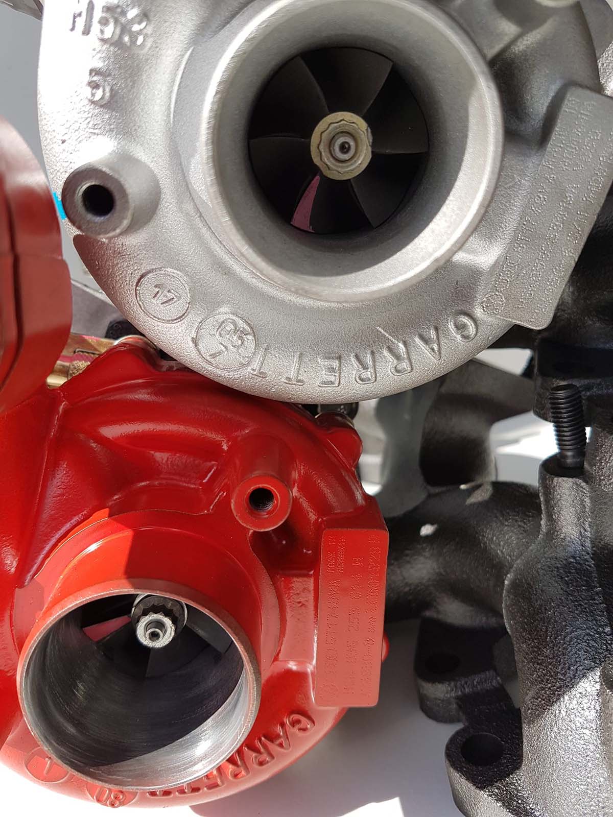 close up of red and silver car turbo